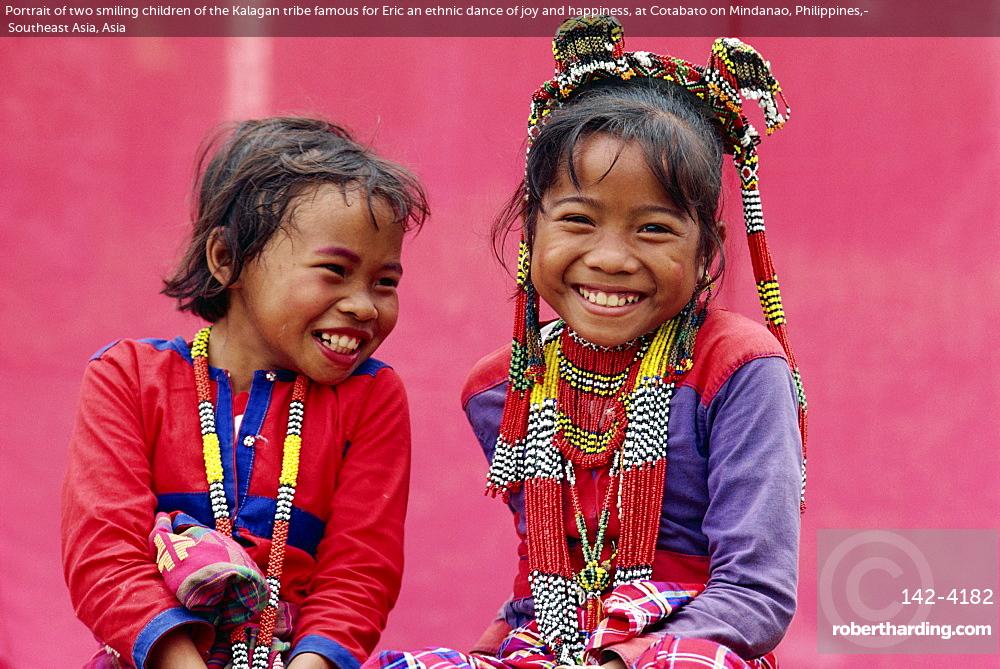 Portrait of two smiling children of the Kalagan tribe famous for Eric an ethnic dance of joy and happiness, at Cotabato on Mindanao, Philippines, Southeast Asia, Asia
