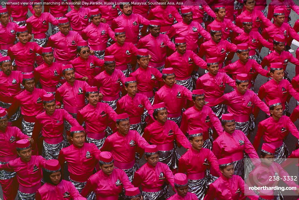 Overhead view of men marching in National Day Parade, Kuala Lumpur, Malaysia, Southeast Asia, Asia