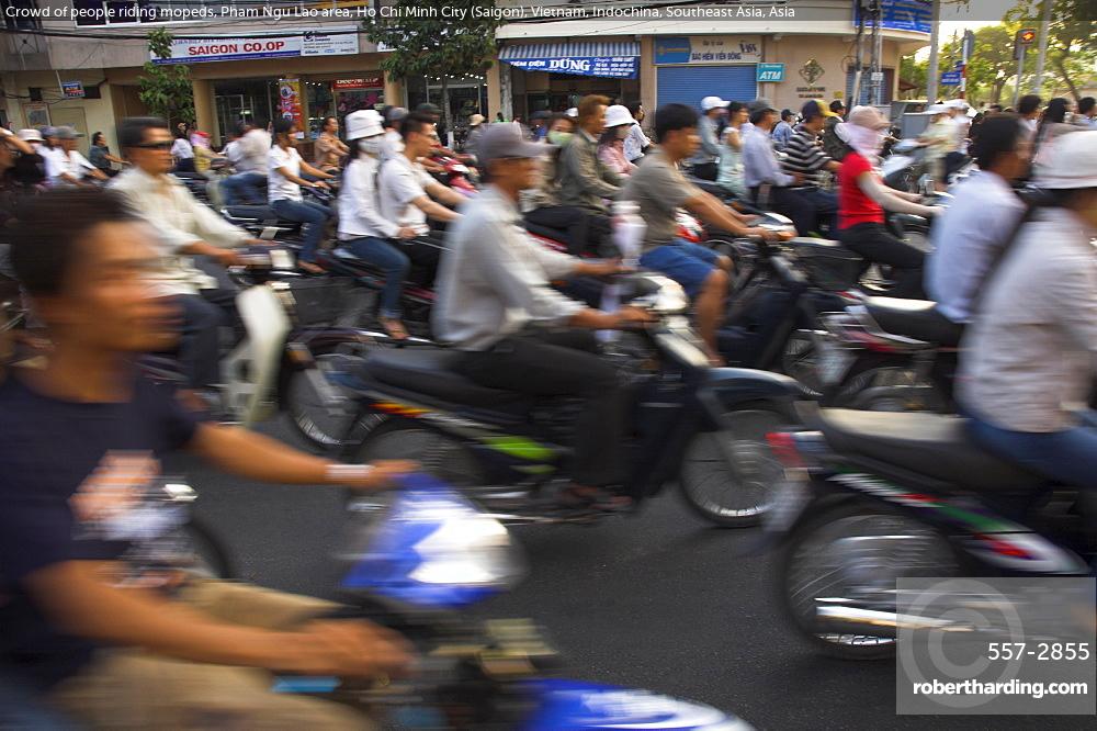 Crowd of people riding mopeds, Pham Ngu Lao area, Ho Chi Minh City (Saigon), Vietnam, Indochina, Southeast Asia, Asia
