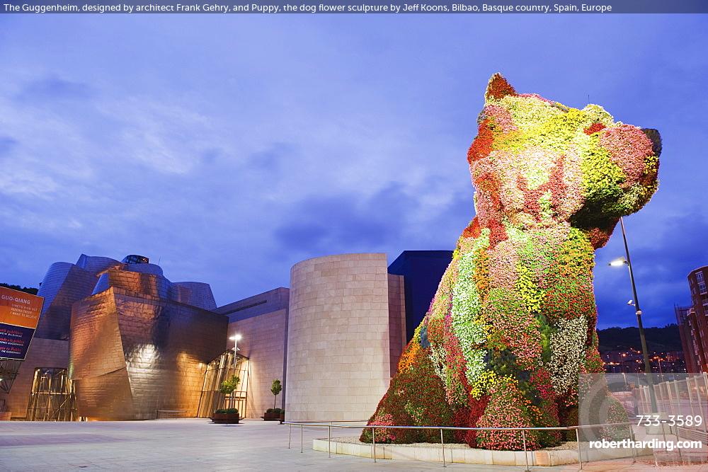 The Guggenheim, designed by architect Frank Gehry, and Puppy, the dog flower sculpture by Jeff Koons, Bilbao, Basque country, Spain, Europe