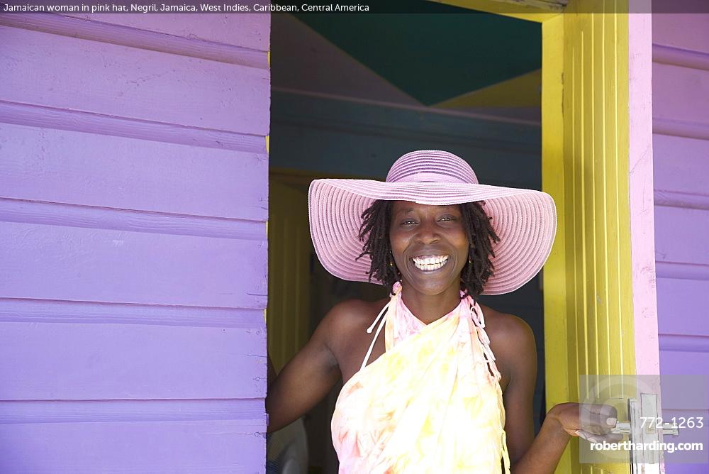 Jamaican woman in pink hat, Negril, Jamaica, West Indies, Caribbean, Central America