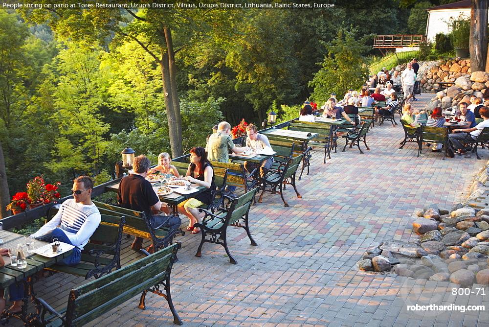 People sitting on patio at Tores Restaurant, Uzupis District, Vilnius, Uzupis District, Lithuania, Baltic States, Europe